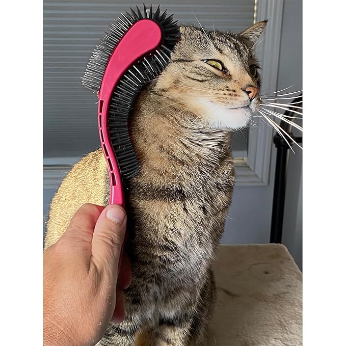 Cat Brush, Pink. Designed for Comfort, Created for Cats and Dogs. Ergonomic shape promotes stress free grooming. Great for long to short haired cats. Made in the USA