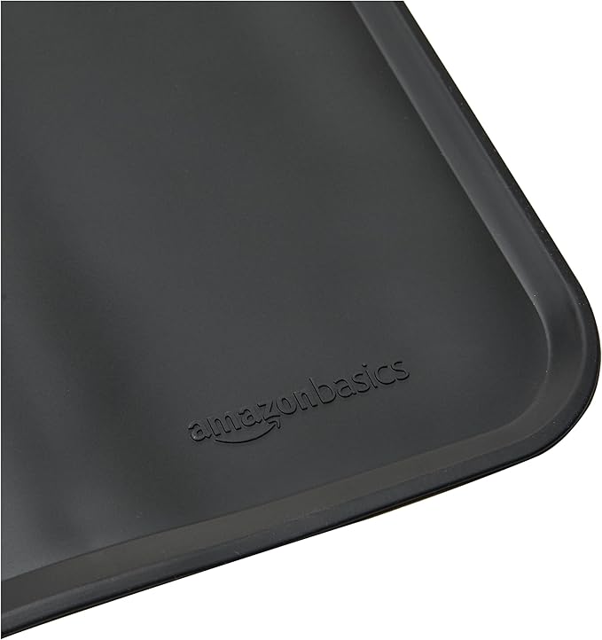Amazon Basics Waterproof Non-Slip Silicone Pet Feeding Mat with Raised Edges, Prevents Spills, Easy to Clean, Protects Floors for Cat & Dog Food and Water Bowls, 24 x 16 Inches, Black