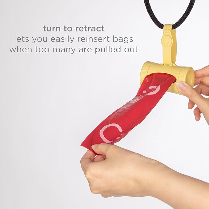 Ubbi Retractable Dog Poop Bag Holder and Dispenser with Silicone Strap Leash Attachment, Includes 2 Rolls of Lavender Scented Leakproof Waste Bags, Yellow