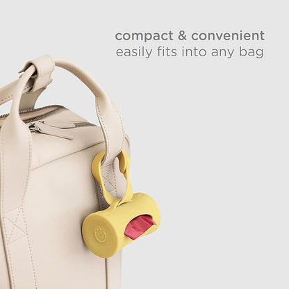 Ubbi Retractable Dog Poop Bag Holder and Dispenser with Silicone Strap Leash Attachment, Includes 2 Rolls of Lavender Scented Leakproof Waste Bags, Yellow