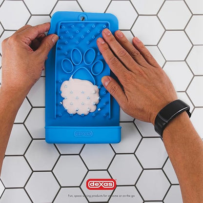Dexas Snack & Distract Licking Mat with Catch Tray for Dogs and Cats-5"x 9", Pro Blue. Sticks to Most Slick or Smooth Surfaces. Eases Anxiety, Prevents Boredom, Entertains and Distracts.