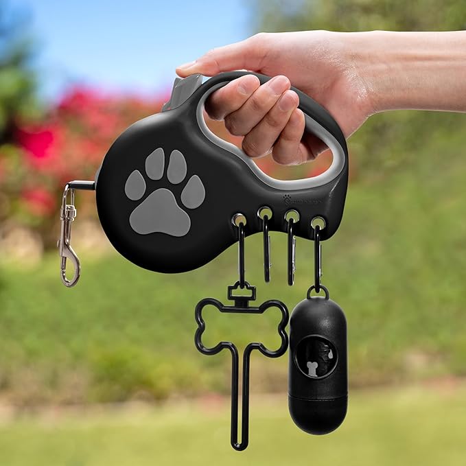 Award-Winning Retractable Dog Leash for Small and Medium Dogs (Max 55 lbs), Clip & Go System with Reflective Tape and Ergonomic Handle, Includes Clips, Poop Bag Holder and Dispenser, Black