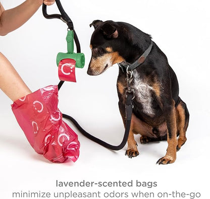 Ubbi Retractable Dog Poop Bag Holder and Dispenser with Silicone Strap Leash Attachment, Includes 2 Rolls of Lavender Scented Leakproof Waste Bags, Green