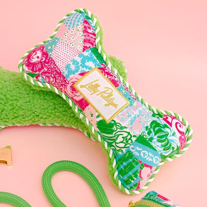 Lilly Pulitzer Dog Chew Toy, Bone Shaped Soft Plush with Fiber Fill, Double-Stitched Durability, Two-Way Squeaker, Embroidered Logo (Crazy Quilt Home)